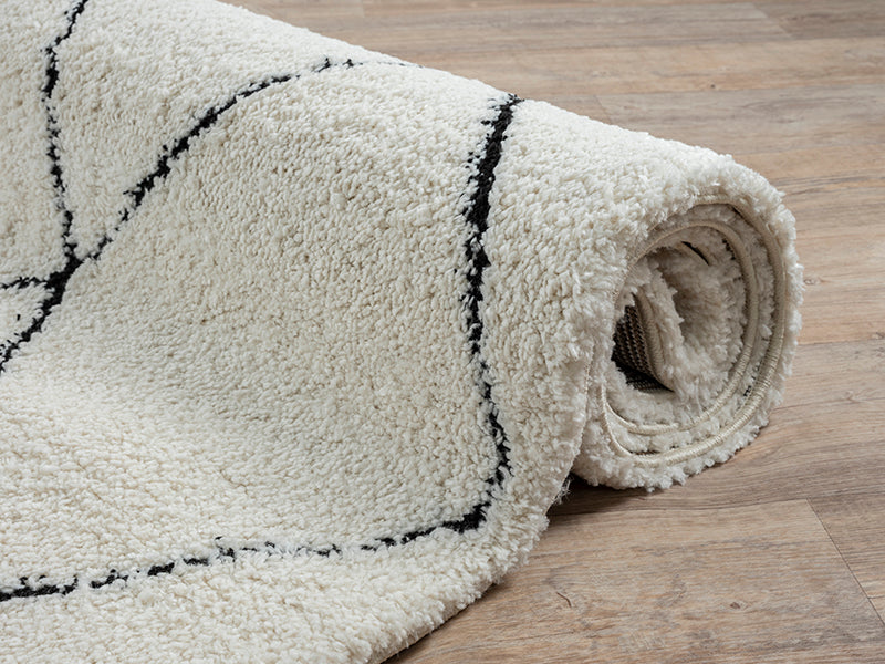 Yuma 8390 – Shaggy-Teppich in Weiß / Schwarz