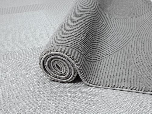 Nira 1995 – Moderner Teppich in Grau